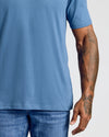 Fiord Classic V-Neck on torso with tattooed arm visible.