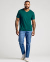 Viridian Classic V-Neck showcased by model in jeans and sneakers.
