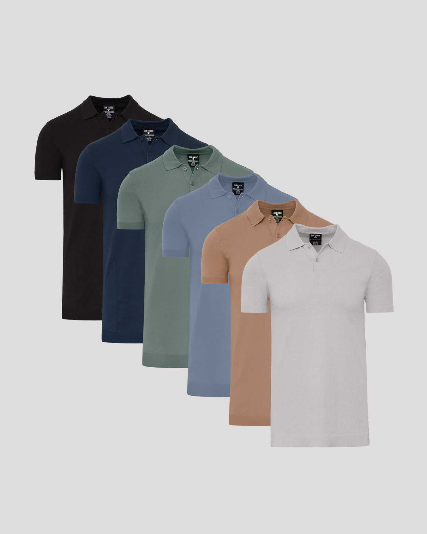 Staple Tall Dressy Polo 6-Pack neatly arranged on a gray background.