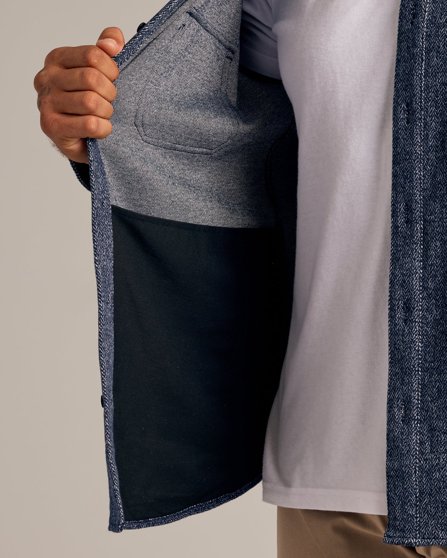 Navy Sweater Shirt Jacket with herringbone texture, two-tone lining, interior pocket.