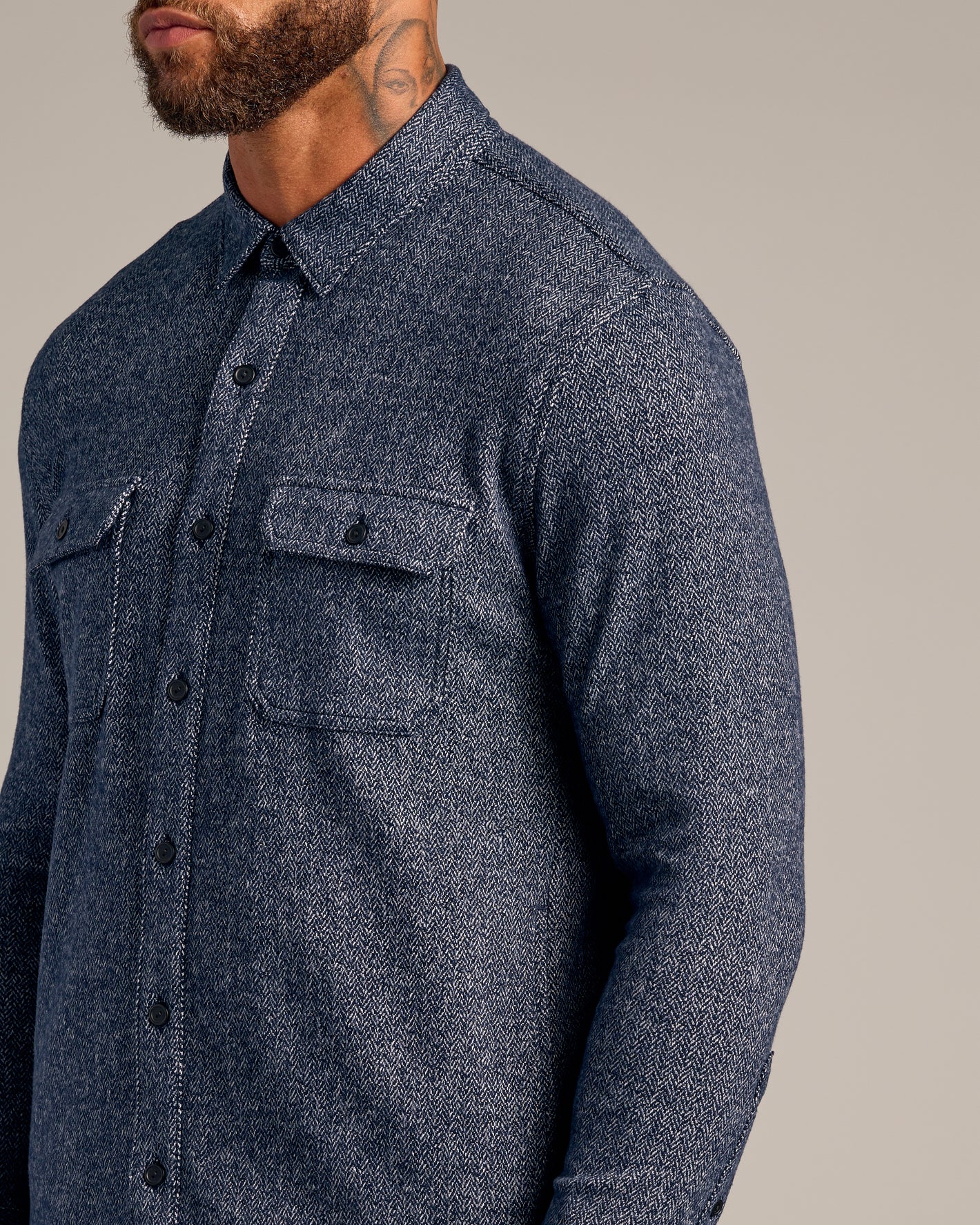 Navy Sweater Shirt Jacket with herringbone pattern and button-flap chest pockets.