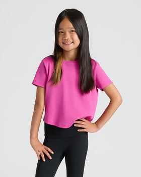 Girl wearing Girls Electric Fuchsia Cropped Boxy Crew Neck Tee.