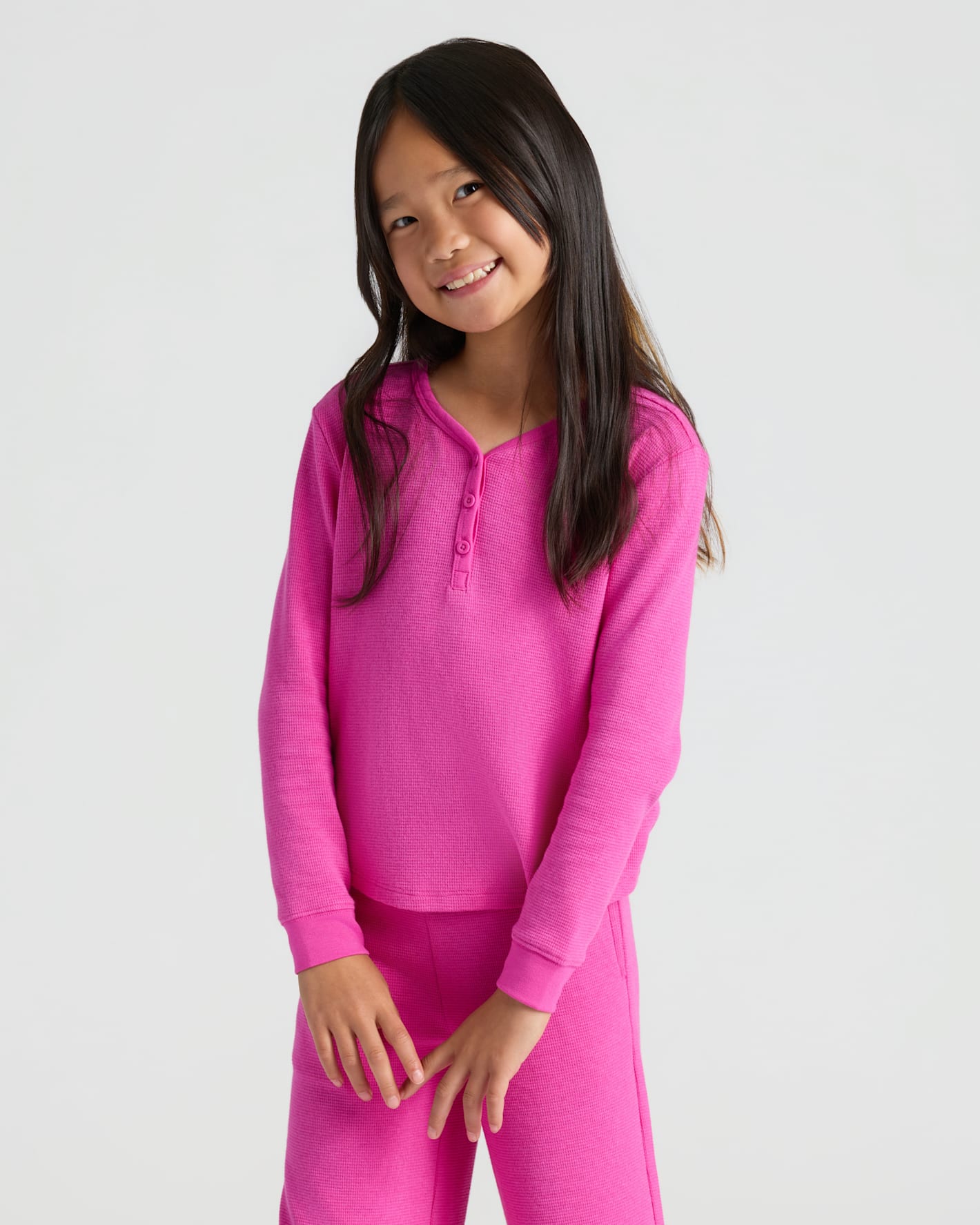 Girl in Girls Electric Fuchsia Waffle Long Sleeve Henley & Waffle Leg Pants.