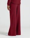 Girls Dark Maroon Waffle Wide Leg Pants with sneakers.