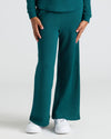 Person wearing Girls Deep Emerald Waffle Long Sleeve Henley & Waffle Leg Pants.