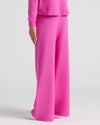 Child wearing Girls Electric Fuchsia Waffle Long Sleeve Henley & Wide Leg Pants.