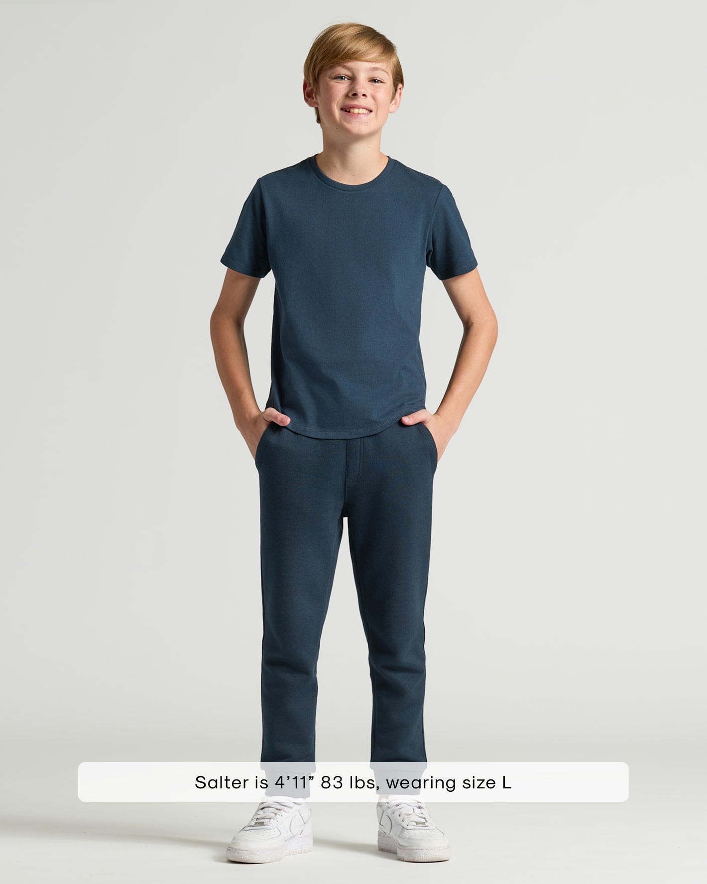Boys' Navy Classic Curved Hem Crew Neck worn by adolescent boy.