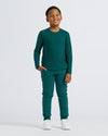 Boy wearing Boys' Classic Long Sleeve Curved Hem Crew Neck, dark green set.