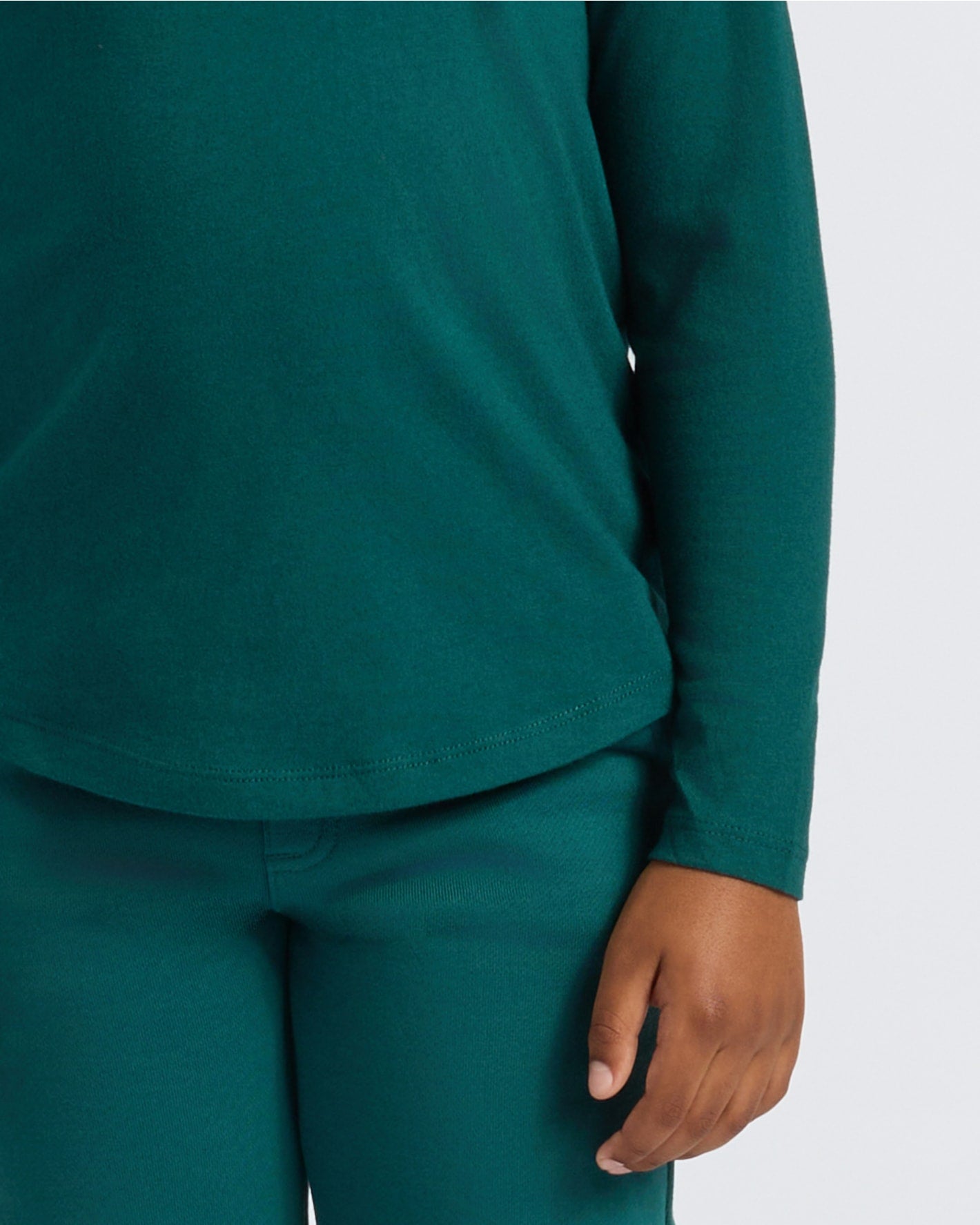 Boys' Deep Emerald Classic Long Sleeve Curved Hem Crew Neck displayed.