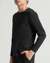 Teen wearing Boys' Classic Long Sleeve Curved Hem Crew Neck.