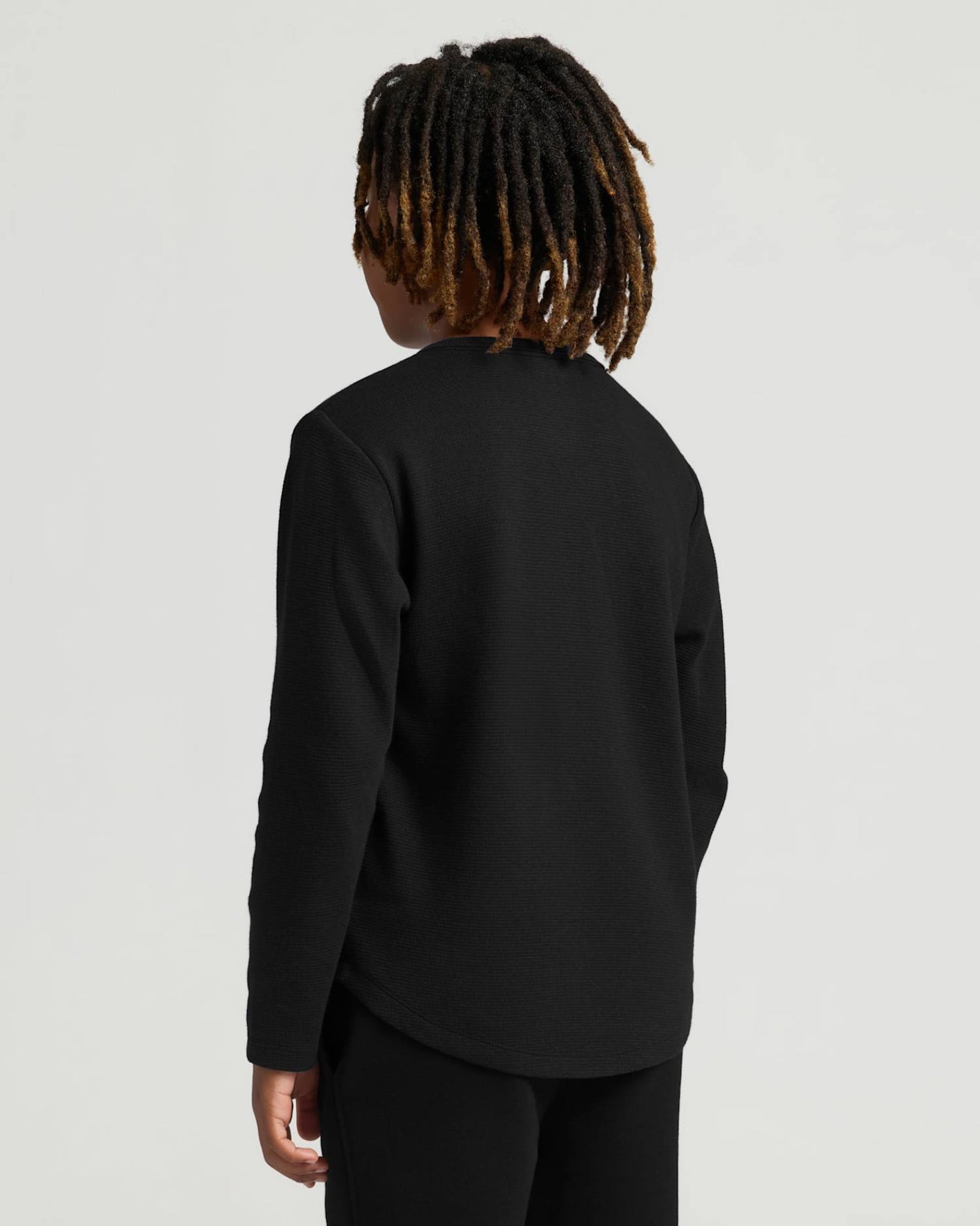 Back view of Boys' Waffle Long Sleeve Henley shirt in black.
