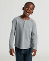 Boys Heather Gray Long Sleeve Waffle Henley worn by joyful boy.