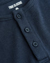 Boys Navy Long Sleeve Waffle Henley with textured fabric and button placket.