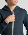 Close-up of Boys' Navy Fleece Full Zip Hoodie being zipped up.