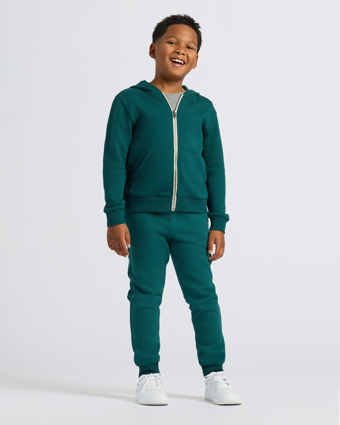 Young boy in Boys Deep Emerald Full Zip Fleece Hoodie & Jogger.