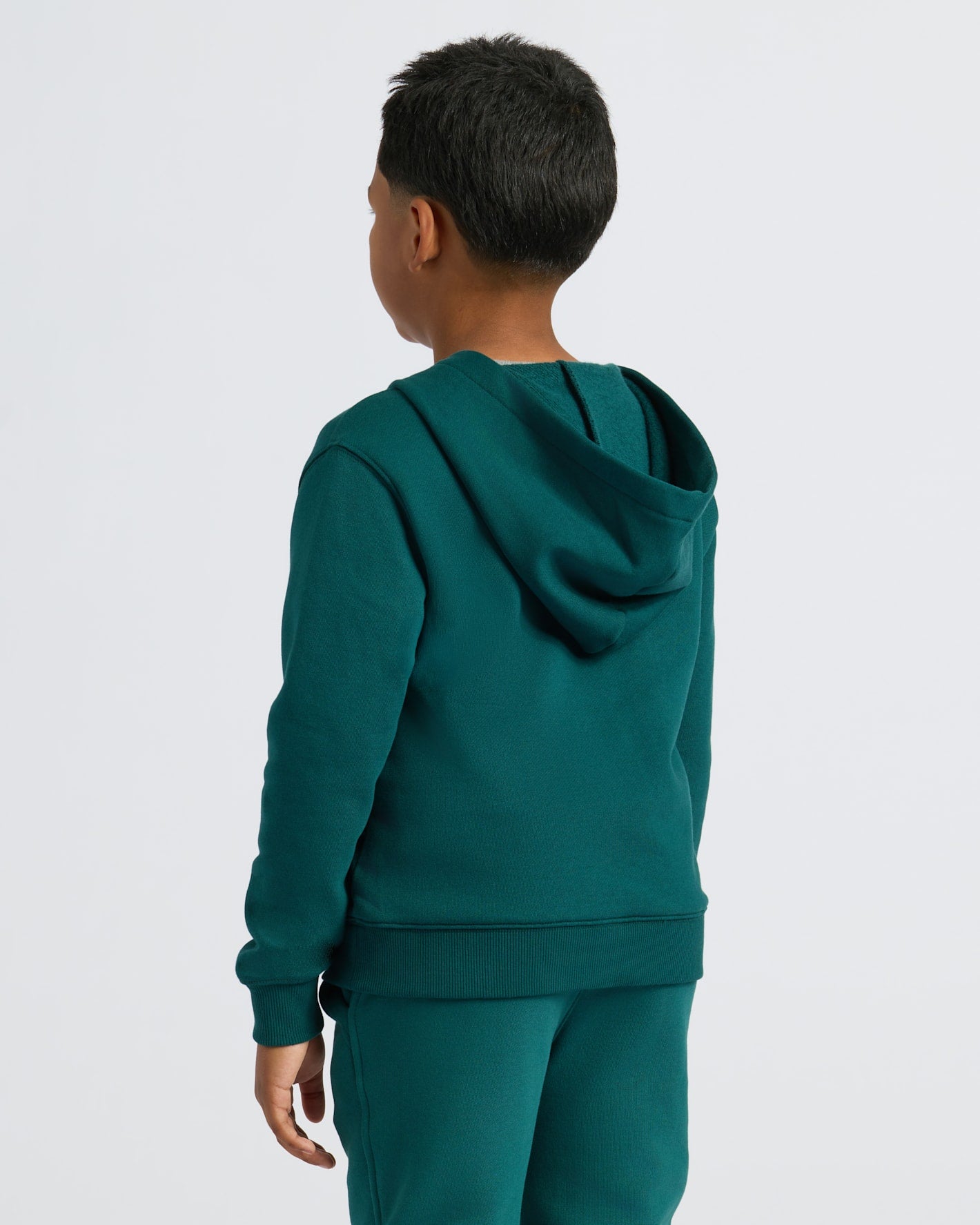 Boy wearing Boys Deep Emerald Full Zip Fleece Hoodie & Jogger.