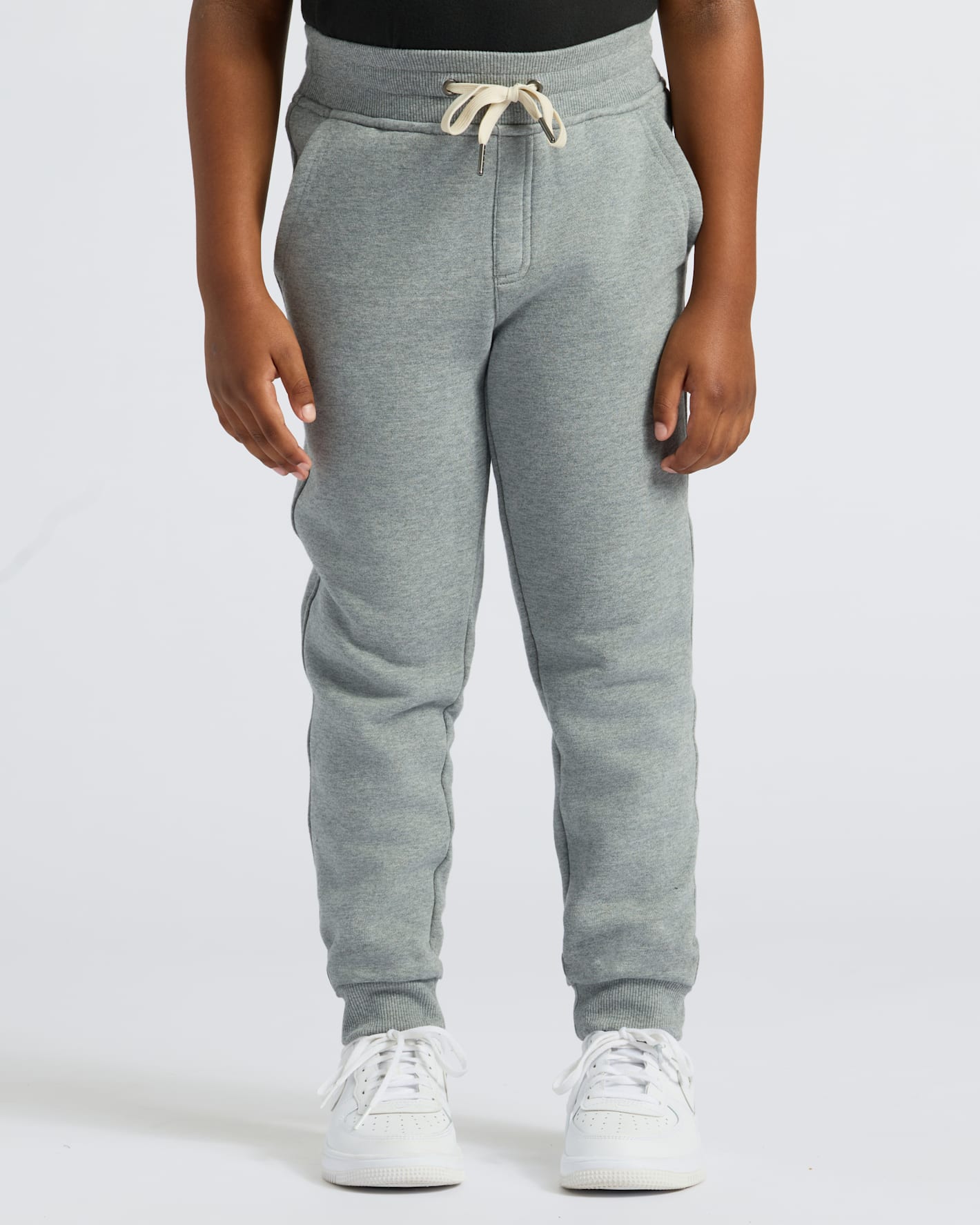 Boys' Medium Heather Gray Fleece Jogger with cream drawstring and pockets.