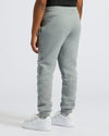 Boys' Medium Heather Gray Fleece Jogger with ribbed cuffs and sneakers.