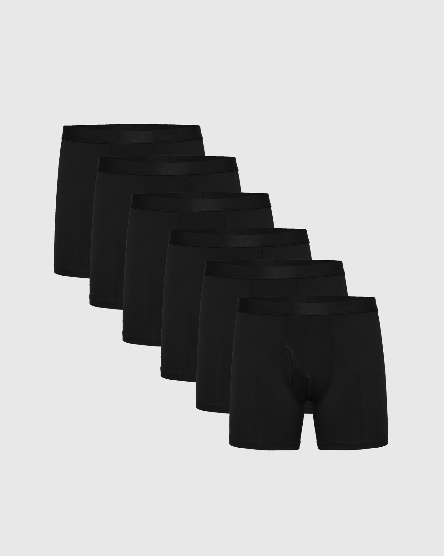 Black Boxer Briefs W/ Fly 6-Pack arranged in a staggered line.