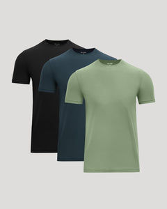 True ClassicThree short-sleeve shirts in black, blue, and green on a light gray background