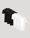 Set of black and white t-shirts on a light gray background
