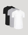 Three plain t-shirts in black, gray, and white on a light gray background
