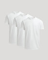 Three white True Classic Men's Heavyweight Curved Hem Crew – Premium Heavyweight Cotton Blend, Modern Athletic Fit, Structured Everyday T-Shirts displayed against a light background.