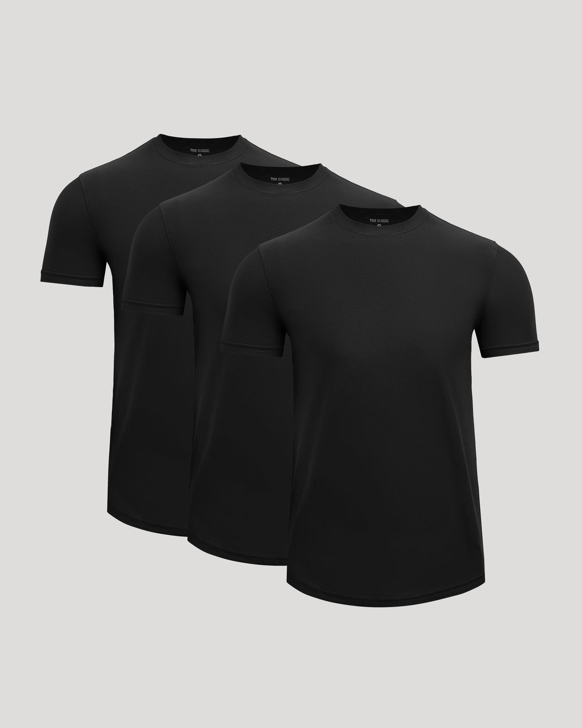 Three black Active Curved Hem Crew Tee - Men's Moisture Wicking Performance T-Shirts displayed on a neutral background, showcasing their men's basics style and moisture-wicking fabric.