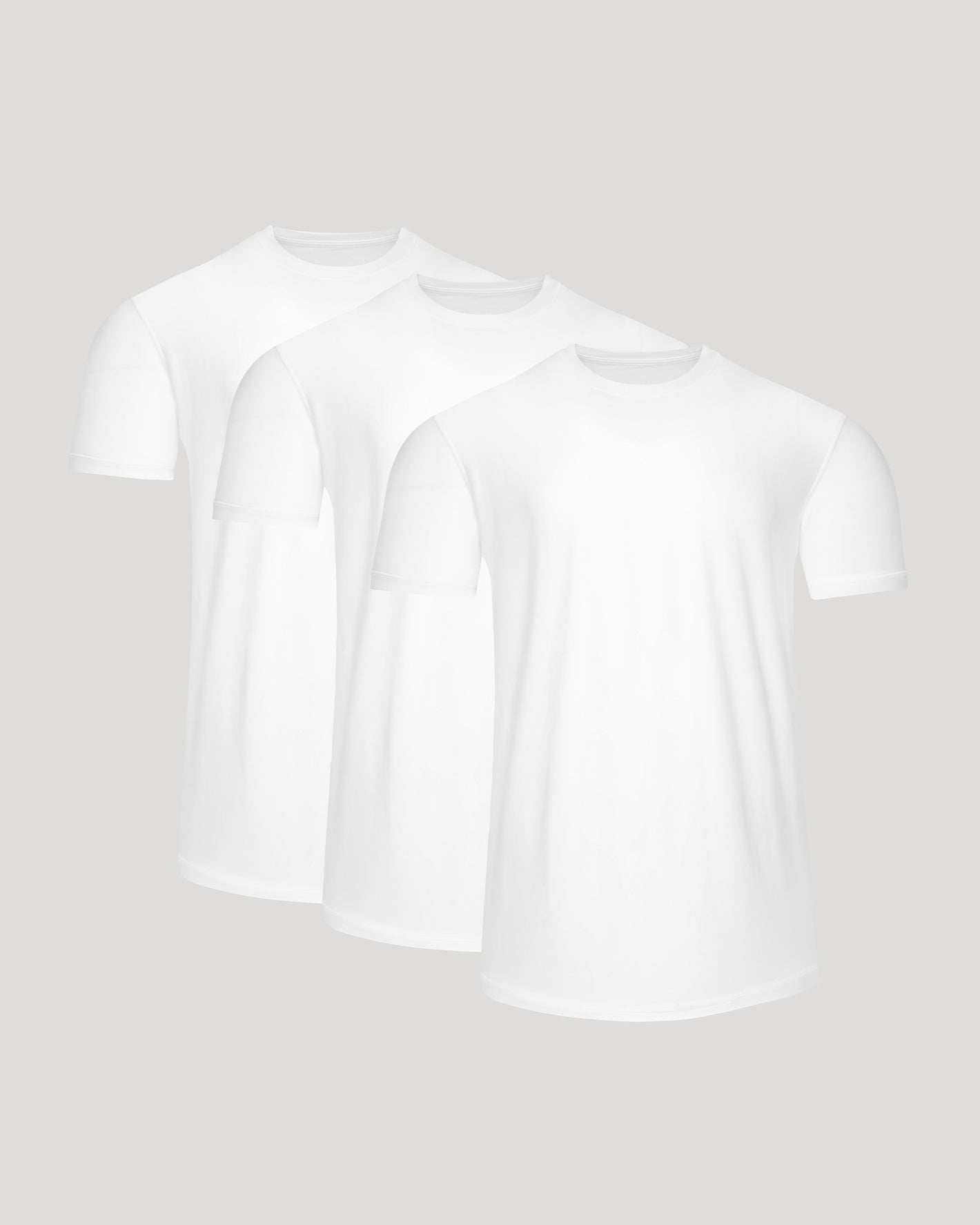 Two white t-shirts on a light gray background