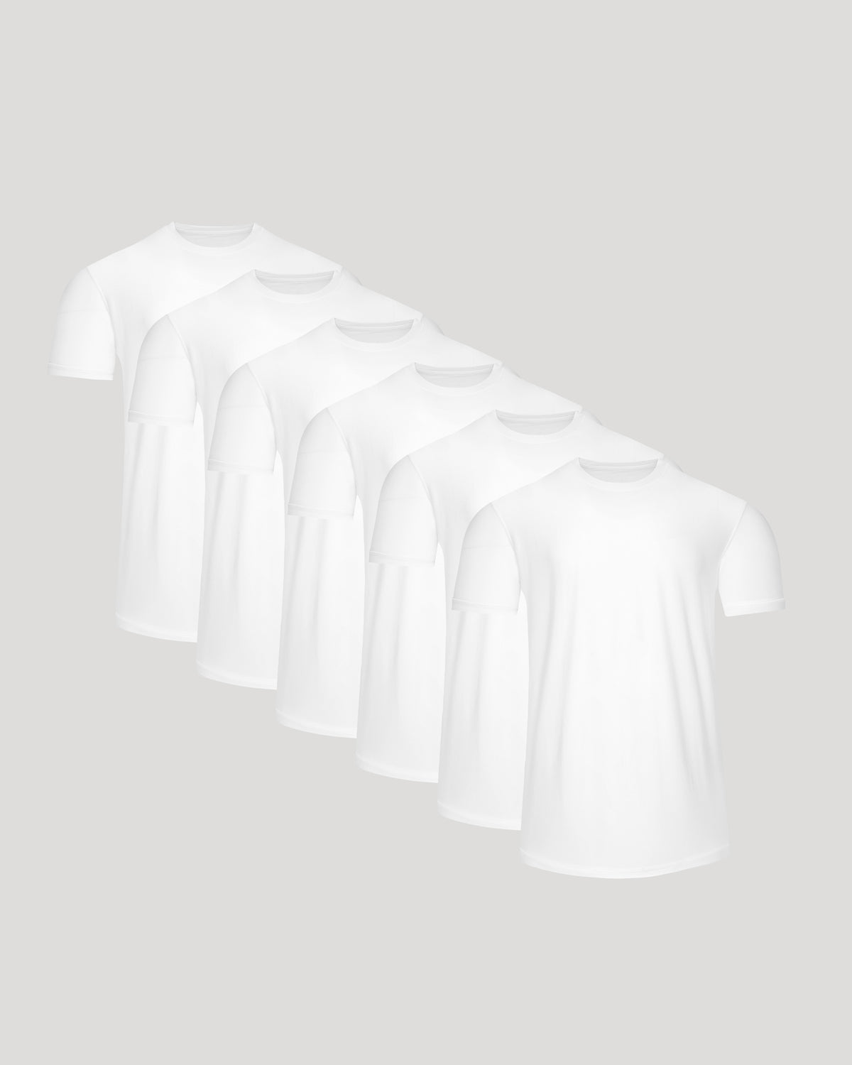 Six white Active Curved Hem Crew Tee - Men's Moisture Wicking Performance T-Shirts displayed in a staggered arrangement, highlighting their soft moisture-wicking fabric and classic fit.