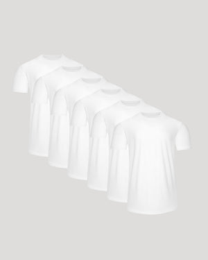Six white Active Curved Hem Crew Tee - Men's Moisture Wicking Performance T-Shirts displayed in a staggered arrangement, highlighting their soft moisture-wicking fabric and classic fit.