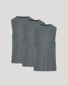 True ClassicThree gray sleeveless shirts stacked on a light gray background