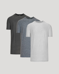 True ClassicThree gray t-shirts in different shades on a light gray background