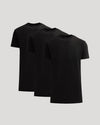 Three black t-shirts stacked on a light gray background