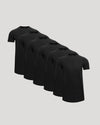 Stack of black t-shirts on a light gray background