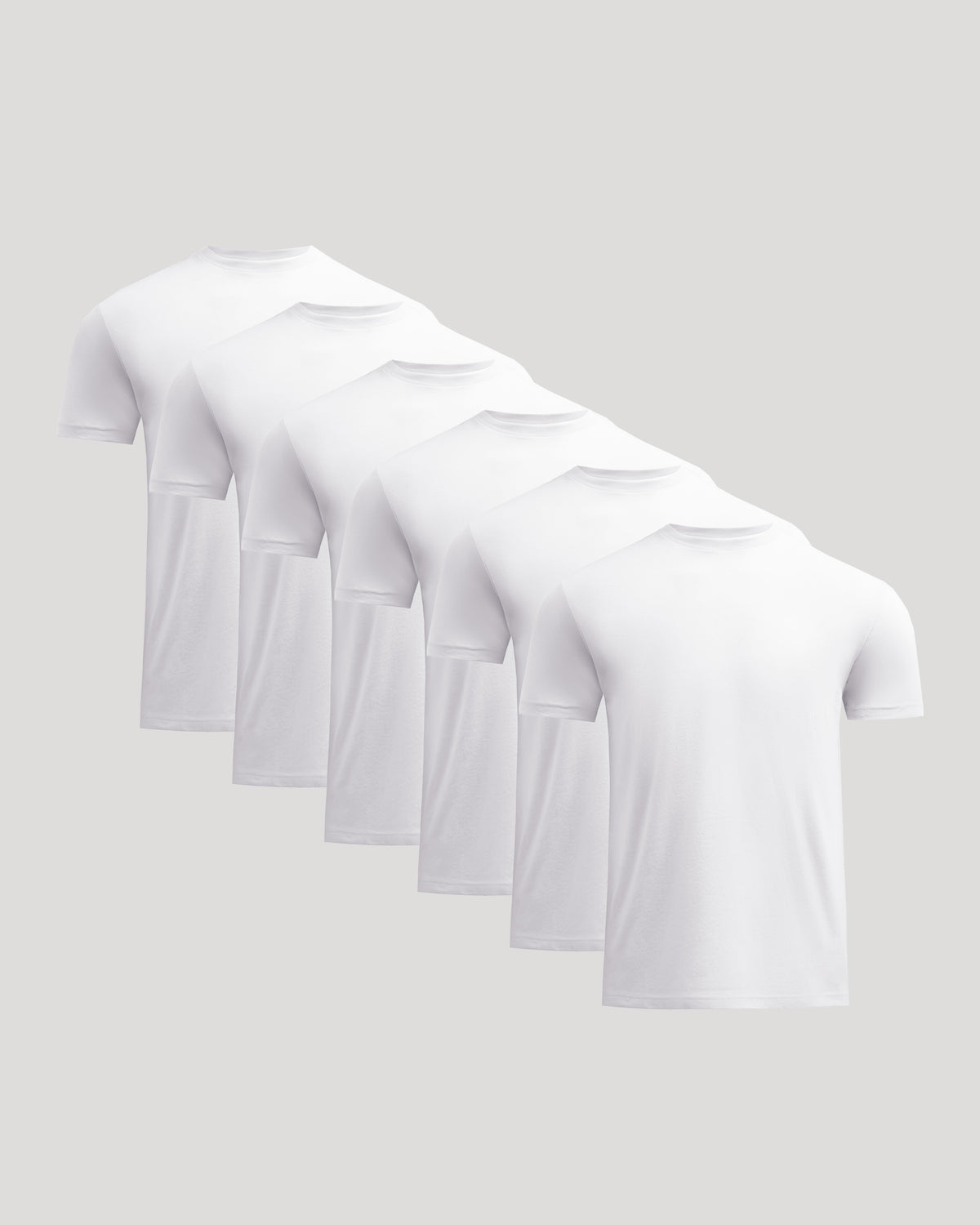 Six plain white crew neck t-shirts arranged in a row, showcasing the Short Classic Crew Neck Tee - Men's Premium Cotton Blend T-Shirt - Athletic Fit as a comfortable men's basics essential.