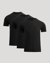 Three black t-shirts stacked on a light gray background