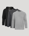 Three long-sleeve shirts in black, gray, and light gray on a light gray background