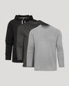 Three long-sleeve shirts in black and gray on a light gray background