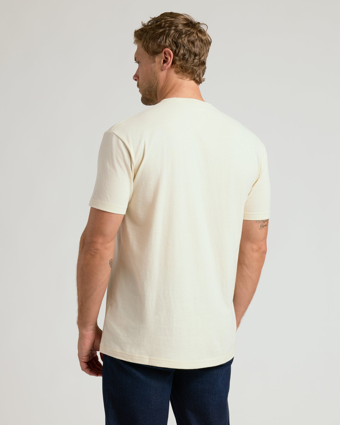 Alabaster Classic Crew Neck T-shirt on man from behind.