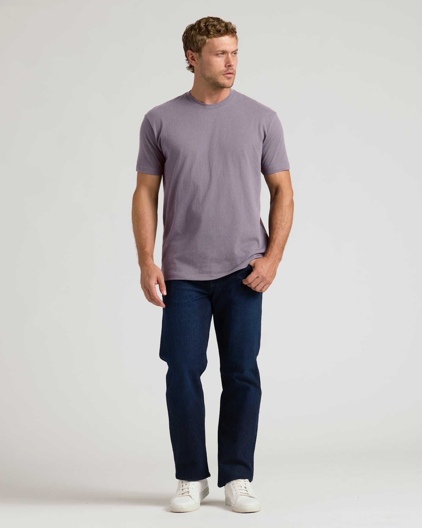 Man wearing Ashberry Classic Crew Neck with jeans and sneakers.