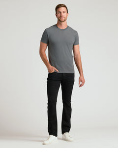 True ClassicMan in Carbon Classic Crew Neck, black jeans, white sneakers.