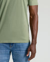 Dark Heather Bay Green Classic Crew Neck on model with blue jeans.