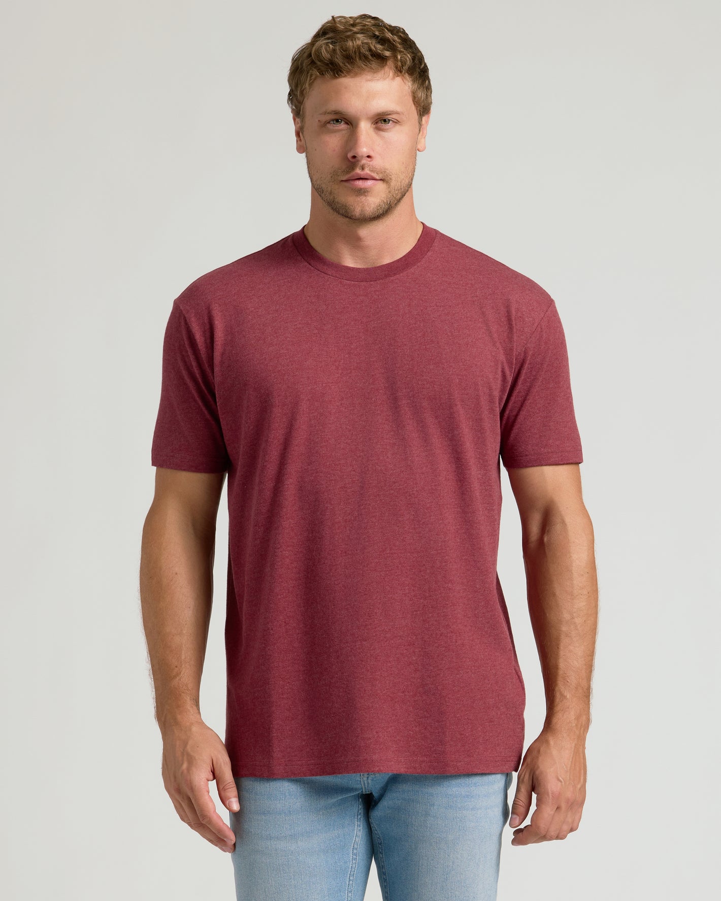 Dark Heather Claret Classic Crew Neck on model with jeans, neutral expression.