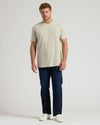 Male model in Dark Heather Graystone Classic Crew Neck and jeans.