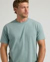 Young man in Heather Balsam Classic Crew Neck T-shirt.