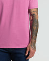Heather Magenta Classic Crew Neck worn with tattooed arm visible.