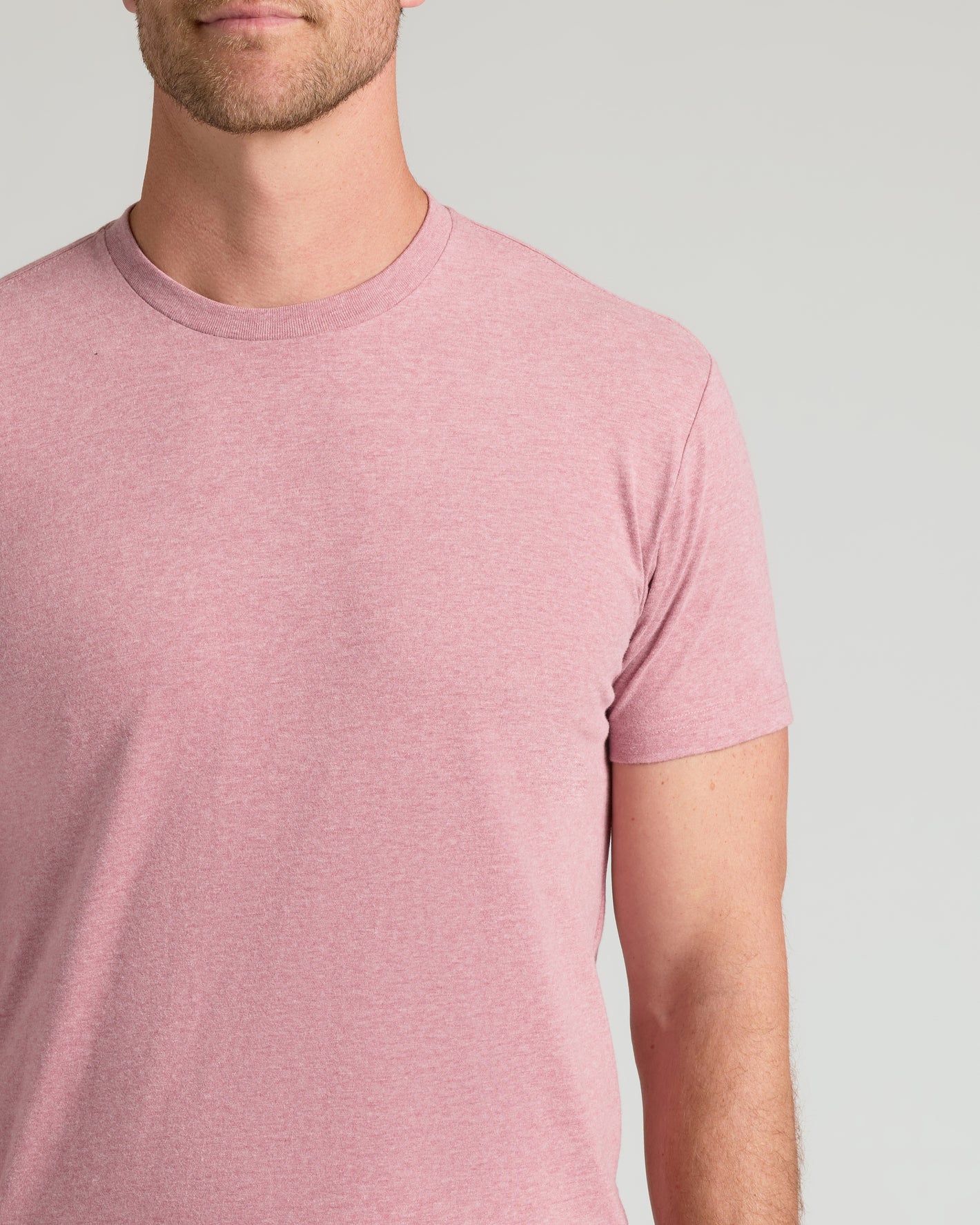 Man wearing Light Heather Boysenberry Classic Crew Neck T-shirt.