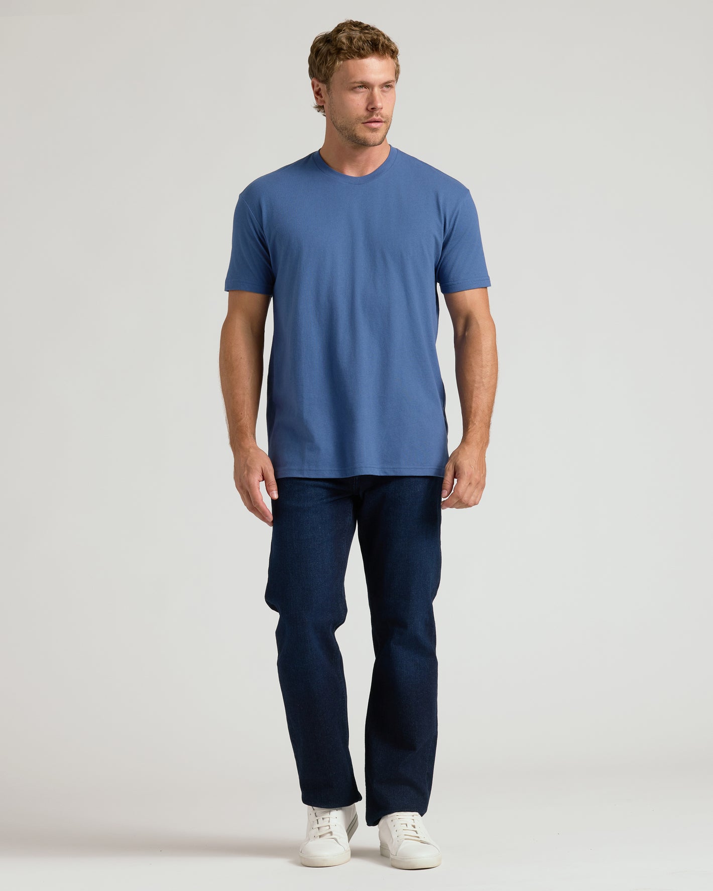 Classic Crew 3-Pack: Blue T-shirt, jeans, white sneakers on model.