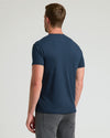 Rear view of man in Classic Crews 6-Pack navy T-shirt.